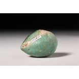 EGYPTIAN FAIENCE GREEN GLAZED MODEL OF A FIG