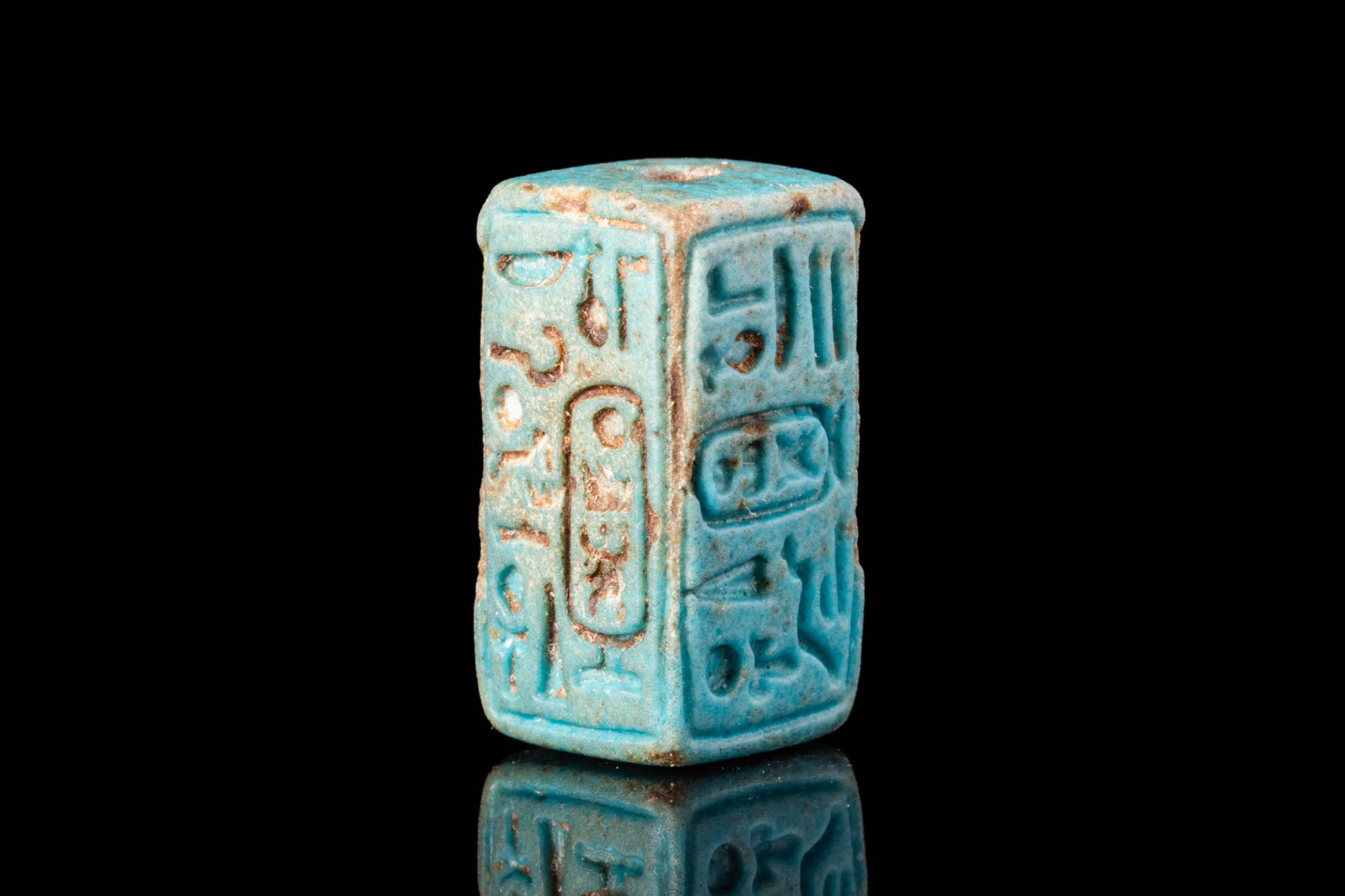 EGYPTIAN FAIENCE CUBOID SEAL WITH FOUR SIDES INSCRIBED