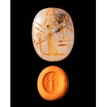 NEO - BABYLONIAN STAMP SEAL DEPICTING A STANDING GOD HOLDING A SCEPTRE