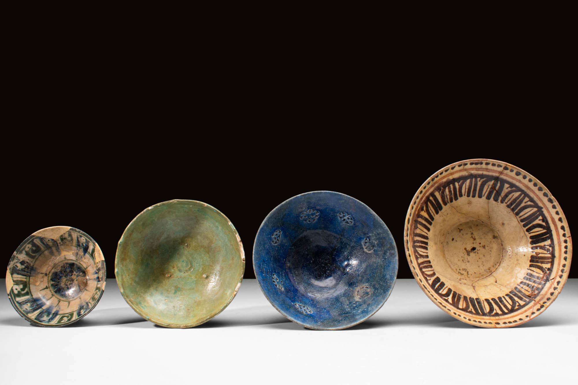 FOUR MEDIEVAL SELJUK GLAZED VESSELS