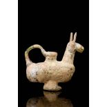 EARLY ISLAMIC ZOOMORPHIC GLASS VESSEL