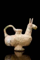 EARLY ISLAMIC ZOOMORPHIC GLASS VESSEL