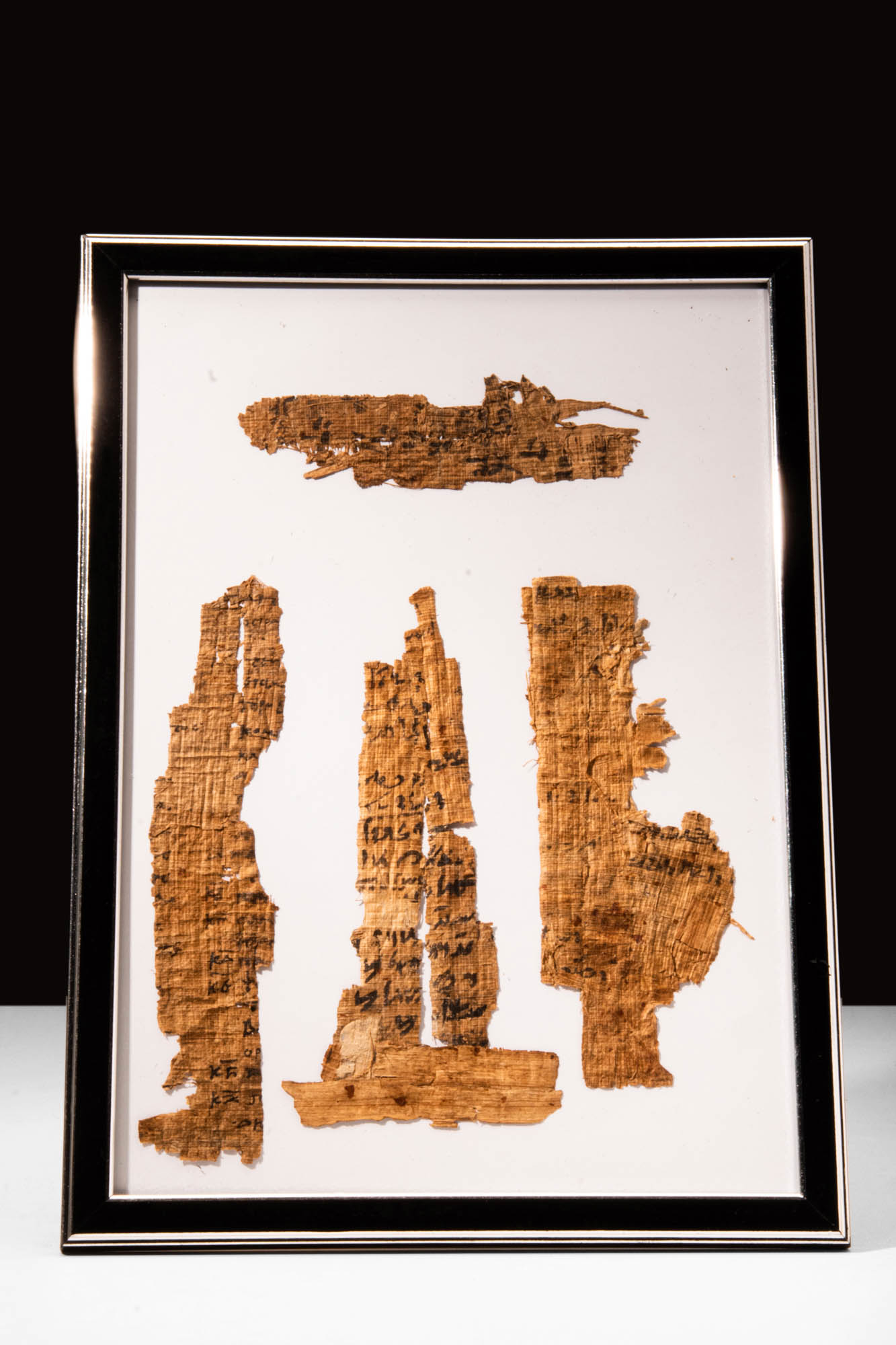 FOUR FRAGMENTS OF PAPYRUS