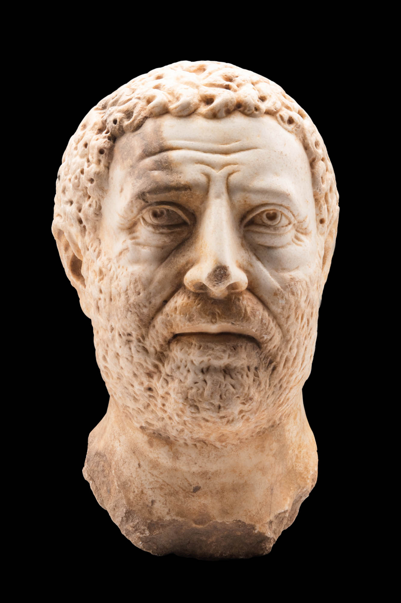 ROMAN MARBLE HEAD OF A BEARDED MAN