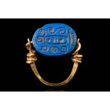 EGYPTIAN LAPIS LAZULI SCARAB SET IN A GOLD RING