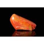 EGYPTIAN FRAGMENT OF A FINGER IN RED JASPER