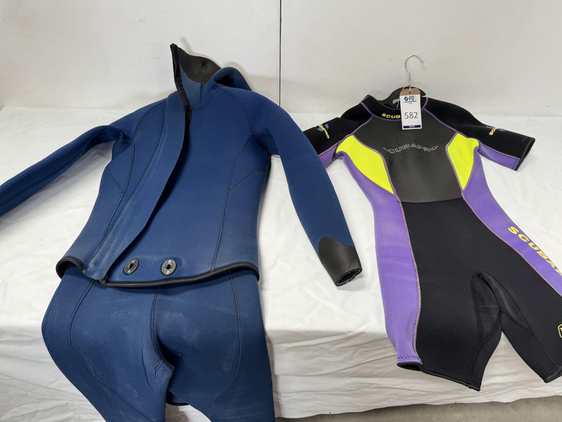 Four Various Wetsuits (Location: Brentwood. Please Refer to General Notes)