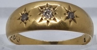 18ct gold and diamond three stone ring. 3g approx. Size M. (B.P. 21% + VAT)
