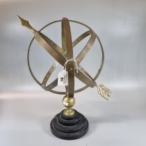 Brass armillary sphere on circular stepped base. (B.P. 21% + VAT)