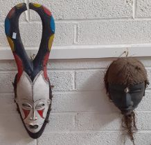 Collection of West African and African tribal masks with hand painted and beaded decoration. (4) (
