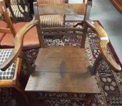 Early 19th century oak bobbin and rail back open farmhouse armchair. (B.P. 21% + VAT)