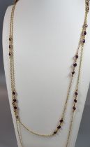 9ct gold and Amethyst guard chain. 19.5g approx. (B.P. 21% + VAT)