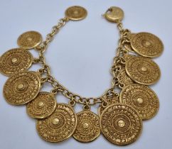 Yves Saint Laurent gold finish gypsy coin bracelet. (B.P. 21% + VAT)