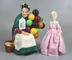 A Royal Worcester figurine 'Grandmother's Dress' 3081 modelled by F.G Doughty and a Royal Doulton '