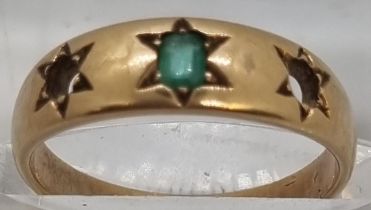 Victorian design yellow metal and Emerald ring (missing two stones). 3g approx. Size L. (B.P.