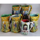 Five majolica pottery tower design jugs with dancing medieval relief moulded figures and entwined