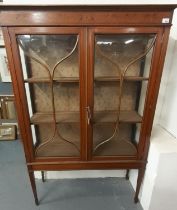 Edwardian satin wood display cabinet, the moulded cornice above a marquetry inlay of swags and