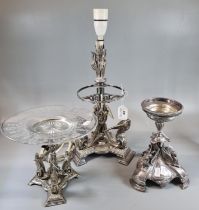 Three silver plated table center pieces, all with animal or bird mounts, one with glass dish top,