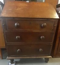 19th century oak fall front bureau above three long drawers with turned knob handles on turned