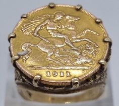 9ct gold ring inset with a 1911 gold half sovereign. 8.8g approx. Size M1/2. (B.P. 21% + VAT)