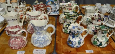 Two trays of Mason's Ironstone dresser jugs in various patterns and sizes including: '