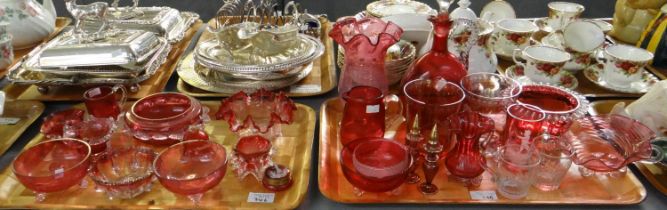 Two trays of mostly cranberry glass to include: Mary Gregory style inkpot and glass, celery vase,