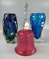 Cranberry glass writhen design hand bell, together with two Murano style blue ground Art glass