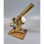 Brass monocular microscope, un-named on wooden base. (Modern). (B.P. 21% + VAT)