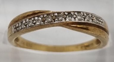 9ct gold nine stone eternity style ring. 2.1g approx. Size L. (B.P. 21% + VAT)