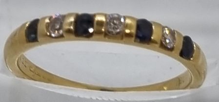 18ct gold diamond and sapphire seven stone ring. 2.3g approx. Size L. (B.P. 21% + VAT)