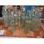 Tray of vintage cod bottles, most marked to include: 'M Phillips Haverfordwest', M.G Williams