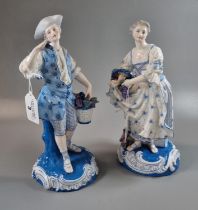 Pair of continental porcelain blue and white figurines of flower sellers. Blue crossed sword marks