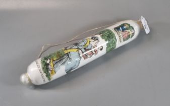 Victorian glass rolling pin depicting coloured transfer printed scenes including: children in the