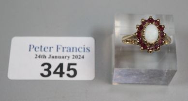9ct gold opal and garnet dress ring. 2.9g approx. Size N. (B.P. 21% + VAT)