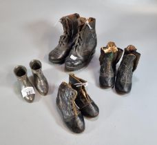 Three pairs of late 19th/early 20th century children's leather boots. Together with a pair of