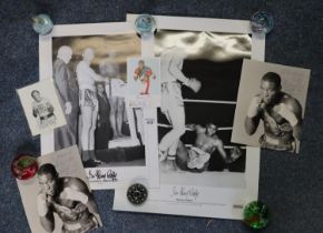 Two signed black and white posters, Henry Cooper and Cassius Clay, weigh-in, signed by Sir Henry