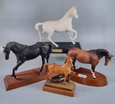 Collection of three Beswick horses on wooden plinths, one 'Spirit of the Wind', together with a
