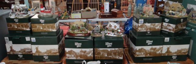 Three trays containing twelve boxed Lilliput lane buildings to include: 'Amazing Grace', 'The