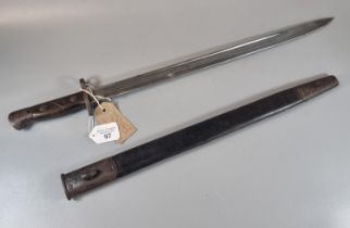 British Enfield WWI period bayonet and scabbard, the scabbard scratch marked 'D J Jenkins 54848,