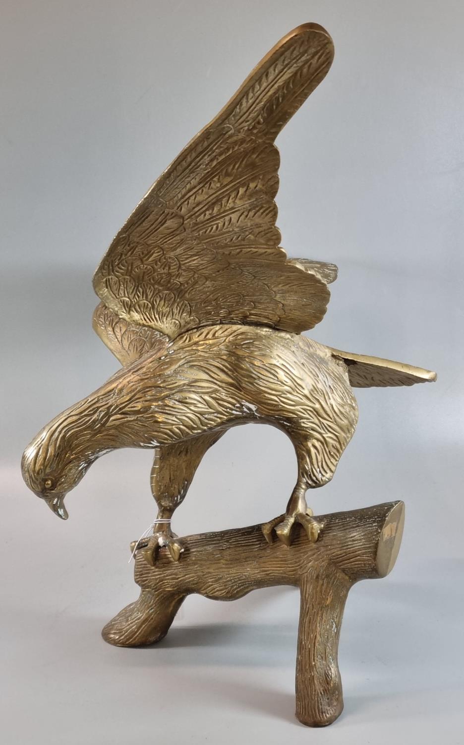 Brass sculpture of an eagle with outstretched wings, alighting on a branch. 55cm wide approx. (B. - Image 2 of 2