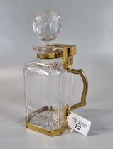 Early 20th century Betjemanns patent decanter and stopper with gilded frame and lock (missing