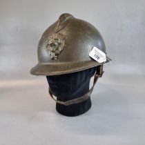 WWII French design Adrian steel helmet with Belgian Army lions head crest. With lining and chin