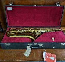 Band Instument Co 'The Elkhart' saxophone marked Elkhart-India USA, in original velvet lined case.