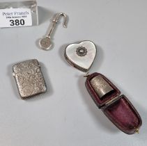 Silver engraved Vesta case together with a silver and mother of pearl heart shaped pill box,