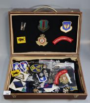 Collection of assorted military patches, blazer badges and cap badges, including: US Air Forces in