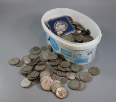Tub of mainly silver coinage to include: Crowns, Florins etc. together with a Maria Theresa Thaler