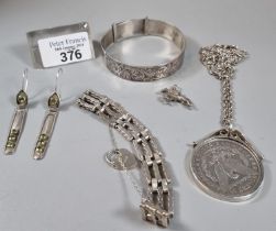 Bag of silver to include: bangle, three bar gate bracelet, USA $1 coin in pendant mount and chain
