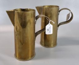 Trench Art - pair of WWI period brass shell cases fashioned into jugs with conical spouts and loop