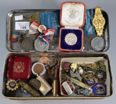 Forfar shortbread tin containing an assortment of pin badges, commemorative medals and medallions