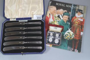 Royal Maundy Royal Mint silver coin set dated 1982 in fitted box and the Pictorial History of the